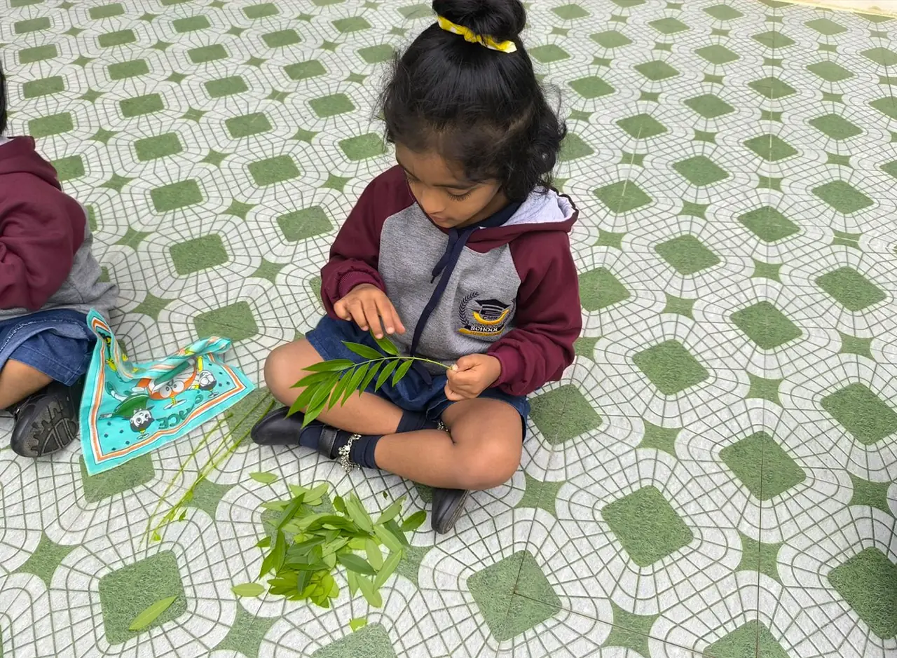 A child exploring at CMR International School
